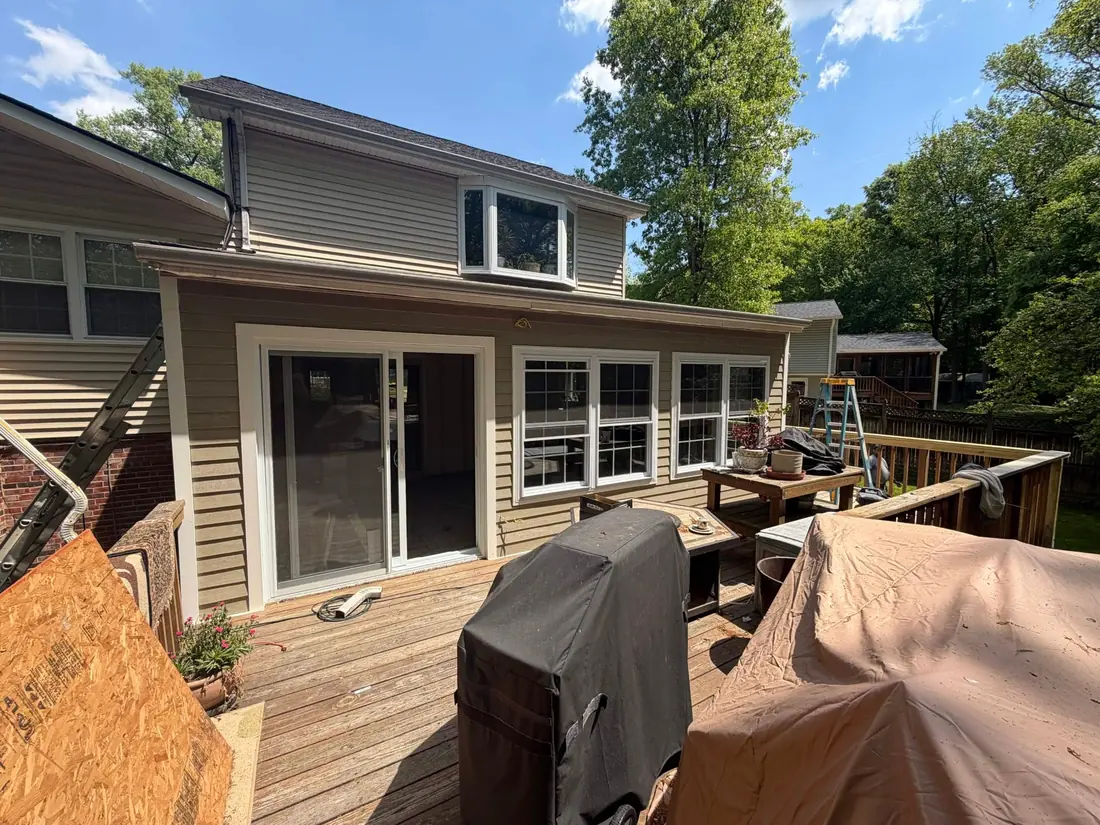 Covered porch turned into a sunroom addition
