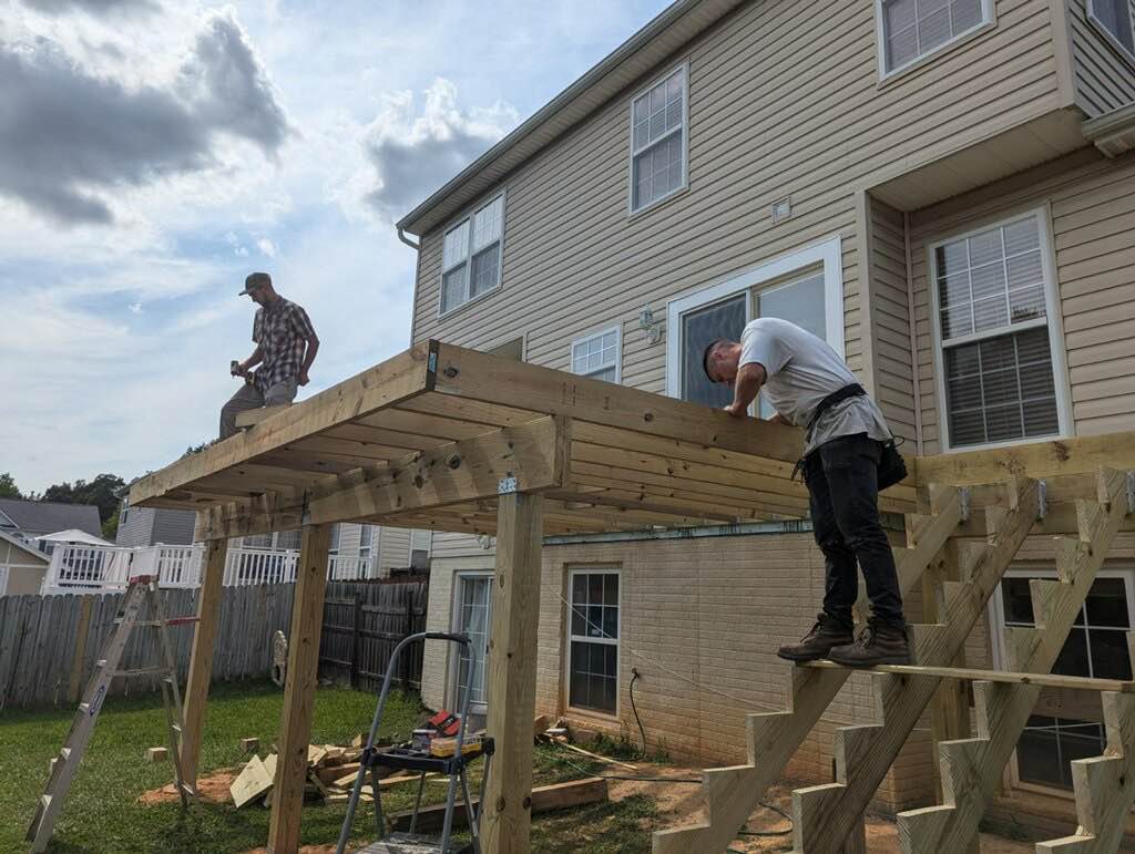 Framing a backyard deck, joist by joist
