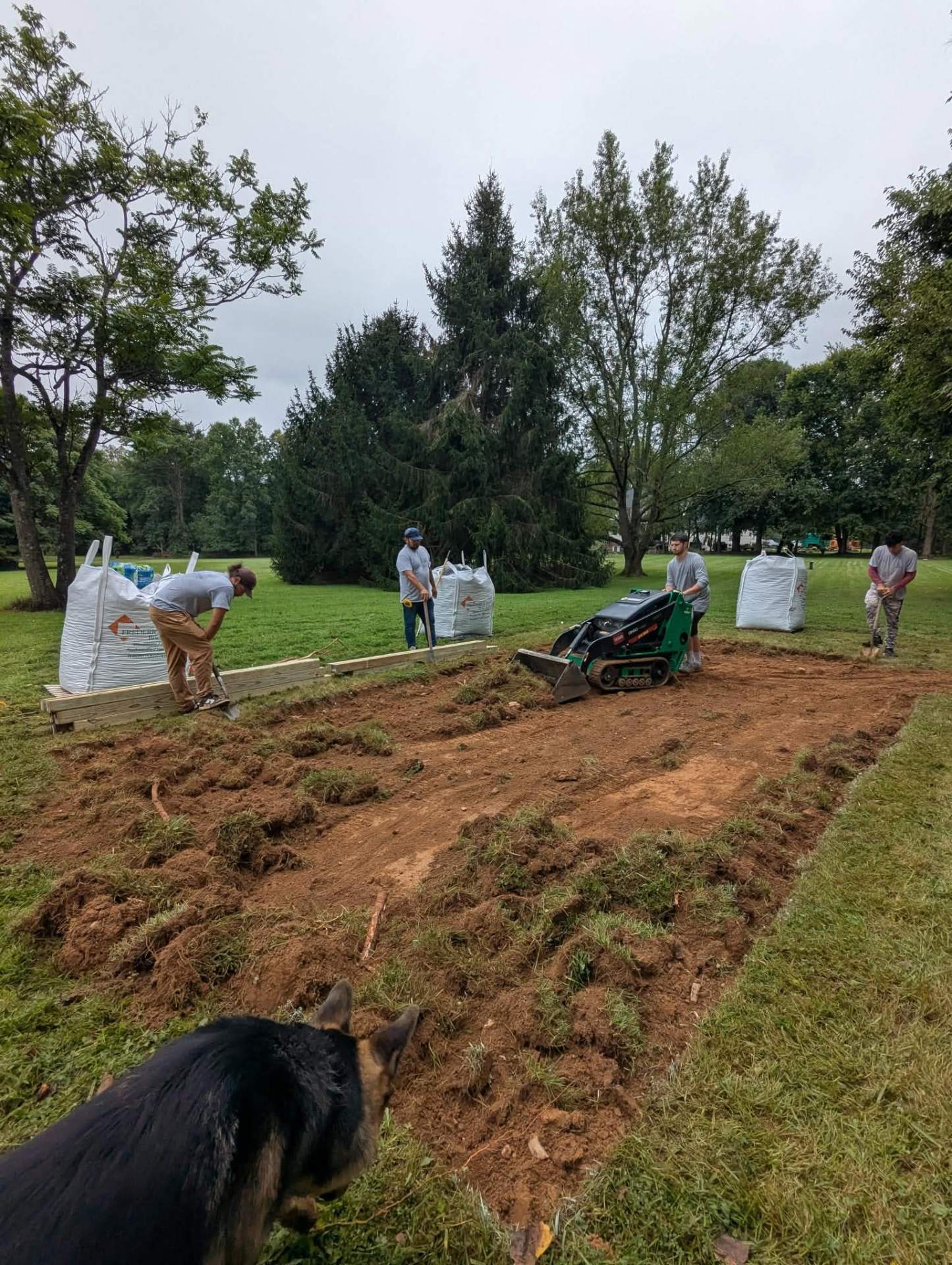 Perpetual Improvements crew prepping a backyard for a new build in Northern Virginia